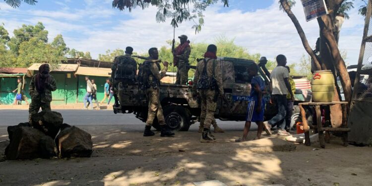 Members of Ethiopian National Defense Force (ENDF) prepare to head to mission, in Sanja, Amhara region near a border with Tigray, Ethiopia November 9, 2020. REUTERS/Tiksa Negeri