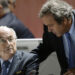 FILE - FIFA President Sepp Blatter, left, and UEFA President Michel Platini are engaged in conversation during the 65th FIFA Congress held at the Hallenstadion in Zurich, Switzerland, on Friday, May 29, 2015. Swiss prosecutors have charged former FIFA officials Sepp Blatter and Michel Platini with fraud and other offenses. (Walter Bieri/Keystone via AP)