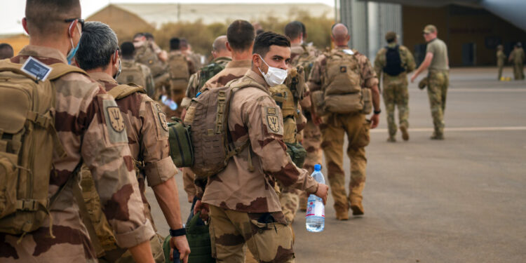 FILE - In this Wednesday June 9, 2021 file photo, French Barkhane force soldiers who wrapped up a four-month tour of duty in the Sahel leave their base in Gao, Mali.  As France prepares to scale back its military presence in Africa, its soldiers are again confronting the very threats that brought the army here in the first place. Earlier this month, French President Emmanuel Macron announced the official end of Barkhane, France’s seven-year operation fighting extremists linked to al-Qaida and the Islamic State in Africa’s Sahel region. (AP Photo/Jerome Delay, File)