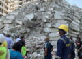 Emergency personnel stands by the debris of the collapsed building in Ikoyi, Lagos, Nigeria, November 1, 2021. Picture taken November 1, 2021. REUTERS/Nneka Chile