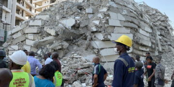 Emergency personnel stands by the debris of the collapsed building in Ikoyi, Lagos, Nigeria, November 1, 2021. Picture taken November 1, 2021. REUTERS/Nneka Chile