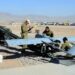 Ground crew prepare a SHADOW 200 Tactical Unmanned Aerial System for launch at Multi National Base Tarin Kot.

Mid Caption: The SHADOW 200 Tactical Unmanned Aerial System will replace the Scan Eagle Unmanned Aerial Vehicle providing Intelligence, Surveillance and Reconnaissance support to Australian and International Security Assistance Force operations in Uruzgan from April.

The SHADOW 200 carries a suite of sensors, including high resolution cameras and laser systems. 

Ground troops are able to view footage and data from the aircraft in real-time on ground terminals. 

The SHADOW 200 system provides the Australian Army with a capable and operationally proven mobile Tactical Unmanned Aerial System.

Photo by Sergeant Mick Davis
1st Joint Public Affairs Unit