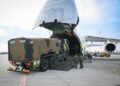 Military equipment of the French army is downloaded from an Antonov 124 freight airplane, at Mihail Kogalniceanu Air Base near Constanta, Romania, on March 3, 2022.  The french military landed on March 3, 2022 at the Mihail Kogalniceanu military base near Constanta, on the shores of the Black Sea to fit into the system of around 500 soldiers that France is deploying urgently within the framework of NATO after the Russia's full-scale invasion in Ukraine just a week ago. (Photo by Daniel MIHAILESCU / AFP)