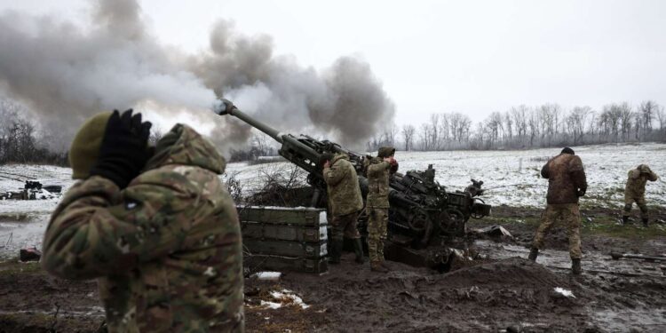 Ukrainian artillerymen fire a M777 howitzer towards Russian positions on the frontline of eastern Ukraine, on November 23, 2022, amid the Russian invasion of Ukraine. (Photo by Anatolii Stepanov / AFP)