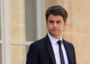 France's Prime Minister Gabriel Attal leaves after the weekly cabinet meeting at the presidential Elysee Palace in Paris on April 17, 2024. (Photo by Bertrand GUAY / AFP)