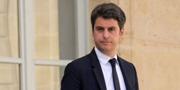 France's Prime Minister Gabriel Attal leaves after the weekly cabinet meeting at the presidential Elysee Palace in Paris on April 17, 2024. (Photo by Bertrand GUAY / AFP)